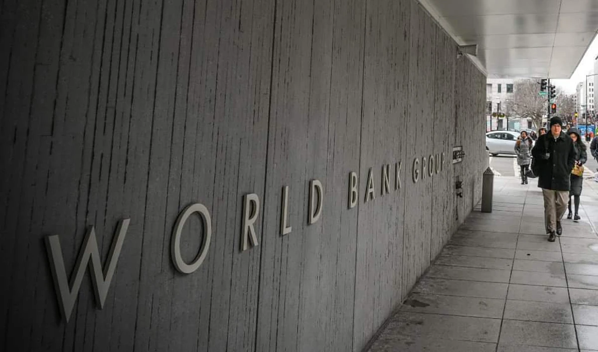 A person walks by the building of the Washington-based global development lender, The World Bank Group, in Washington DC, US on January 17, 2019. (AFP/File)