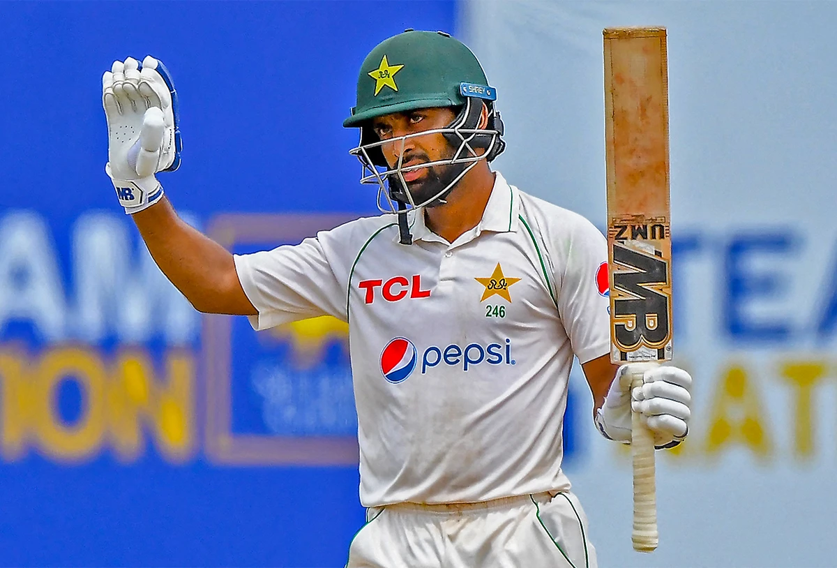 Pakistan’s Abdullah Shafique celebrates after scoring 150 runs during the final day of play of the first cricket Test match against Sri Lanka in Galle on July 20, 2022. (AFP)