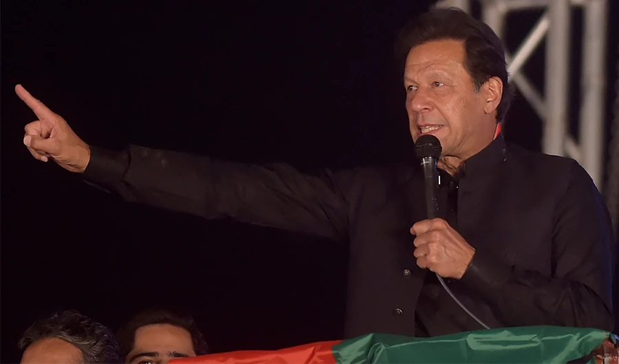 Ousted Pakistan's prime minister Imran Khan delivers a speech to Pakistan Tehreek-e-Insaf (PTI) party's supporters during a public rally in Peshawar on April 13, 2022. (AFP/FILE)