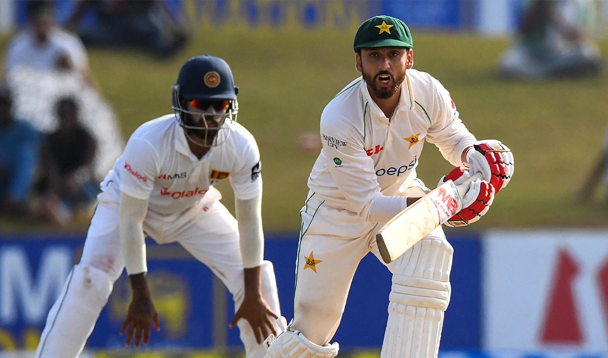 Pakistan's Agha Salman watches the ball after playing a shot during the second day of the second cricket Test match in Galle on July 25, 2022. (AFP)
