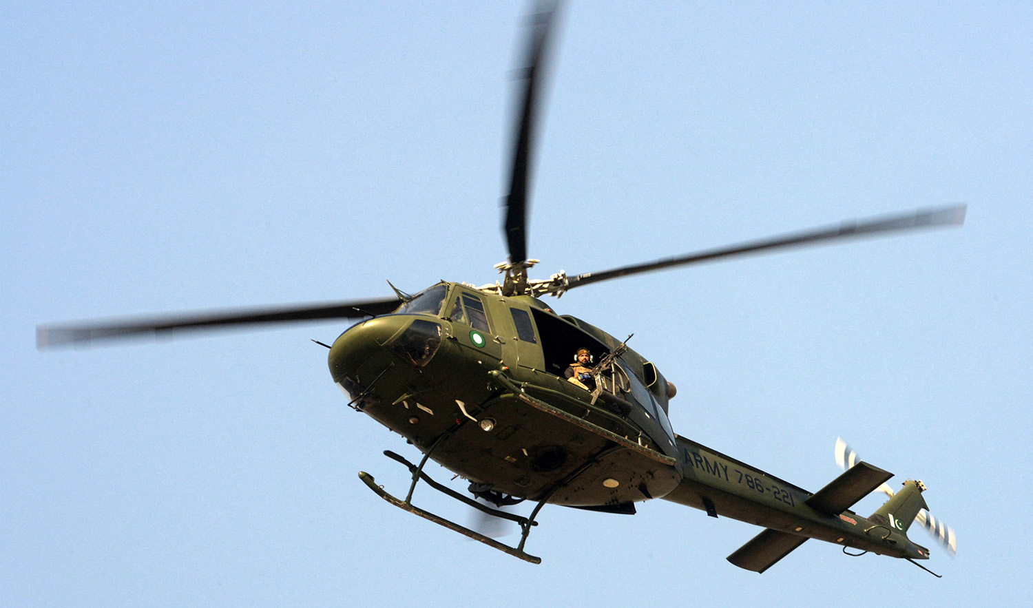 A Pakistani army helicopter patrols in Peshawar on December 1, 2017. (AFP/File)