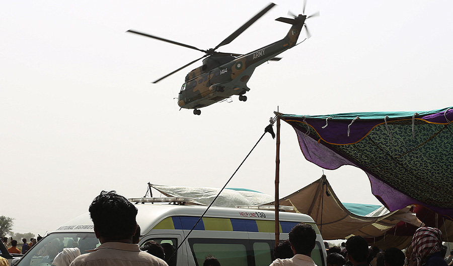 An army helicopter carrying injured passengers takes off from the site of a train accident in Daharki area of the northern Sindh province on June 7, 2021. (AFP/FILE)