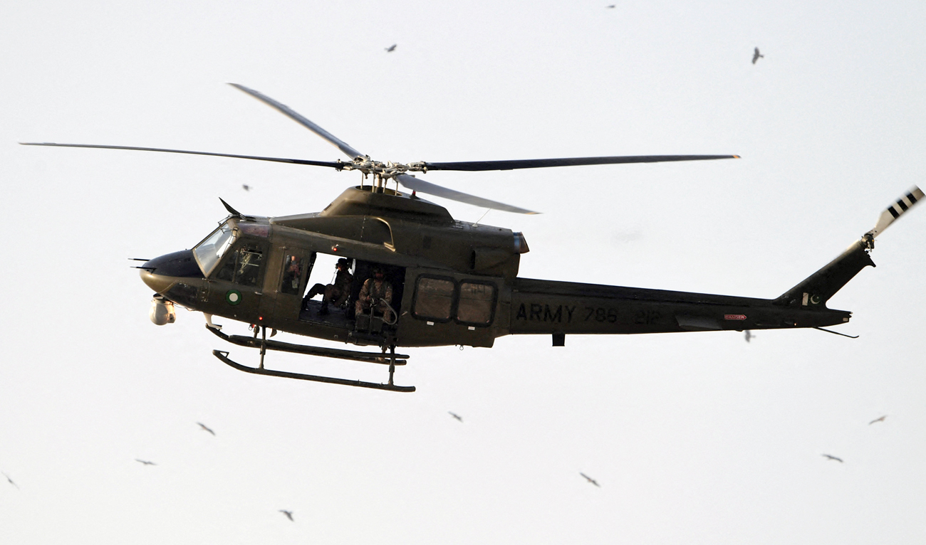 An army helicopter flies around National Stadium in Karachi on February 27, 2021. (AFP/File)
