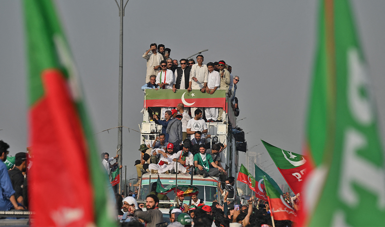 Former Pakistan's prime minister Imran Khan (C-top) leads a rally in Islamabad, Pakistan, on May 26, 2022. (AFP/File)