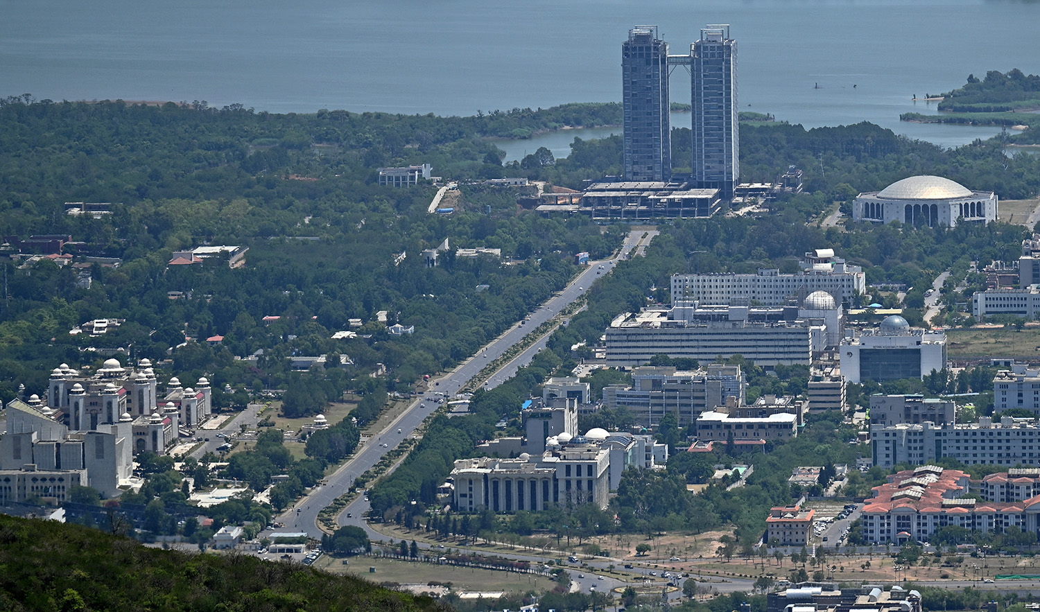 A general view taken from a hilltop shows the Pakistan's capital city Islamabad and its suburbs, on May 27, 2021. (AFP/File)