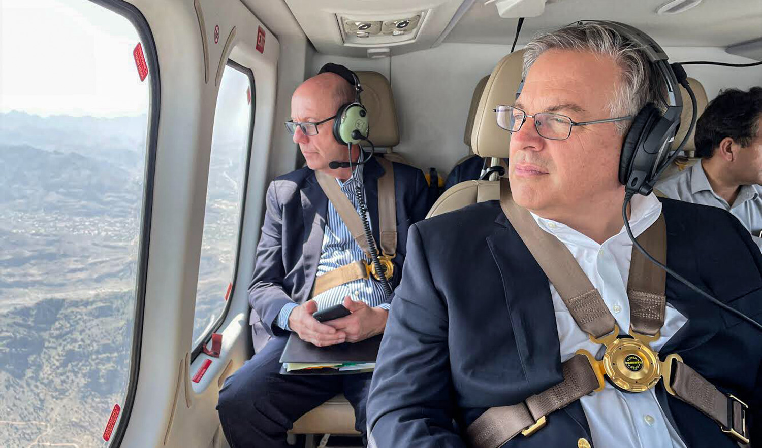 US Ambassador to Pakistan Blome Viceroy, center, is seen in a helicopter during his tour to Khyber Pakhtunkhwa province on August 7, 2022. (Photo courtesy: @ShireenMazari1/Twitter)