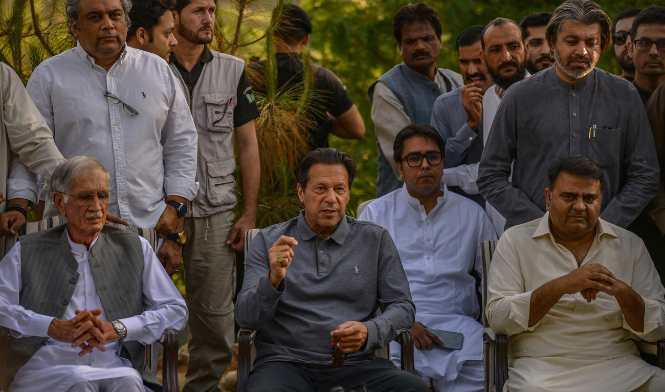 Pakistan's former prime minister Imran Khan (C) gestures during a press conference in Islamabad on April 23, 2022. (AFP/File)