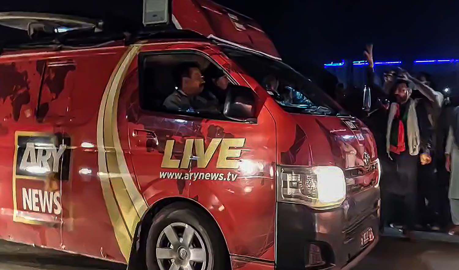 The screen grab taken from a video shared on ARY News' social media shows the news channel's DSNG van. (Photo courtesy: @arynewsofficial/Twitter)