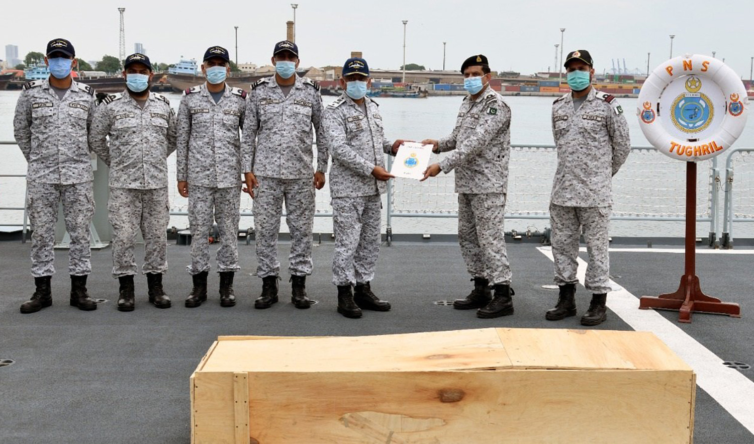 Pakistan Navy hands over the dead body of a crew member of sunken Indian vessel 'Jamna Sagar' to PMSA authorities on August 11, 2022. (Photo courtesy: @PakistanNavy/Facebook)
