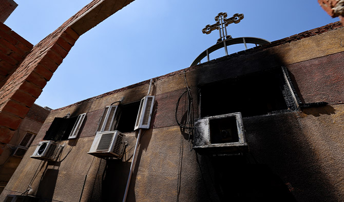 A picture shows the damage at the Abu Sifin church located in the densely populated Imbaba neighbourhood west of the Nile river, part of Giza governorate, on August 14, 2022. (AFP)