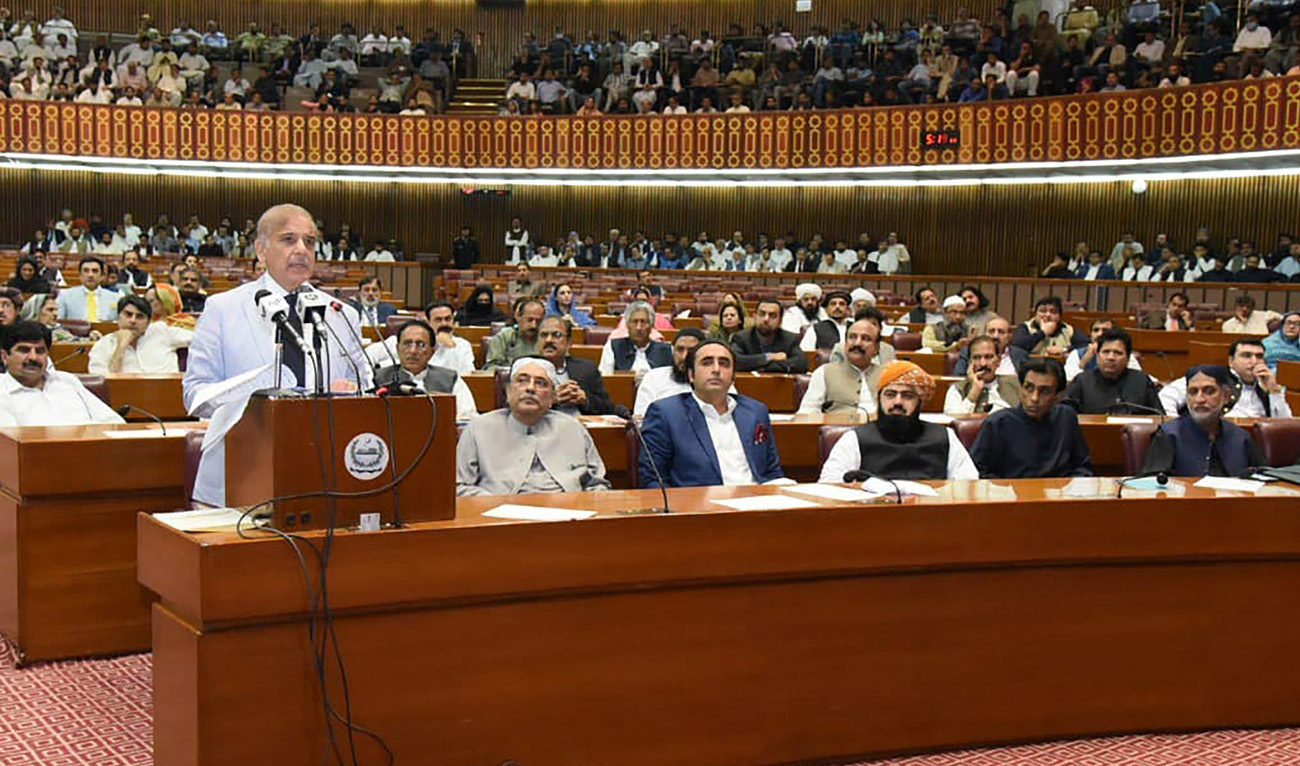 This handout photograph released by the Press Information Department (PID) on April 11, 2022 shows Pakistan's newly elected Prime Minister Shehbaz Sharif (L) addressing the National Assembly in Islamabad. (AFP/FILE)