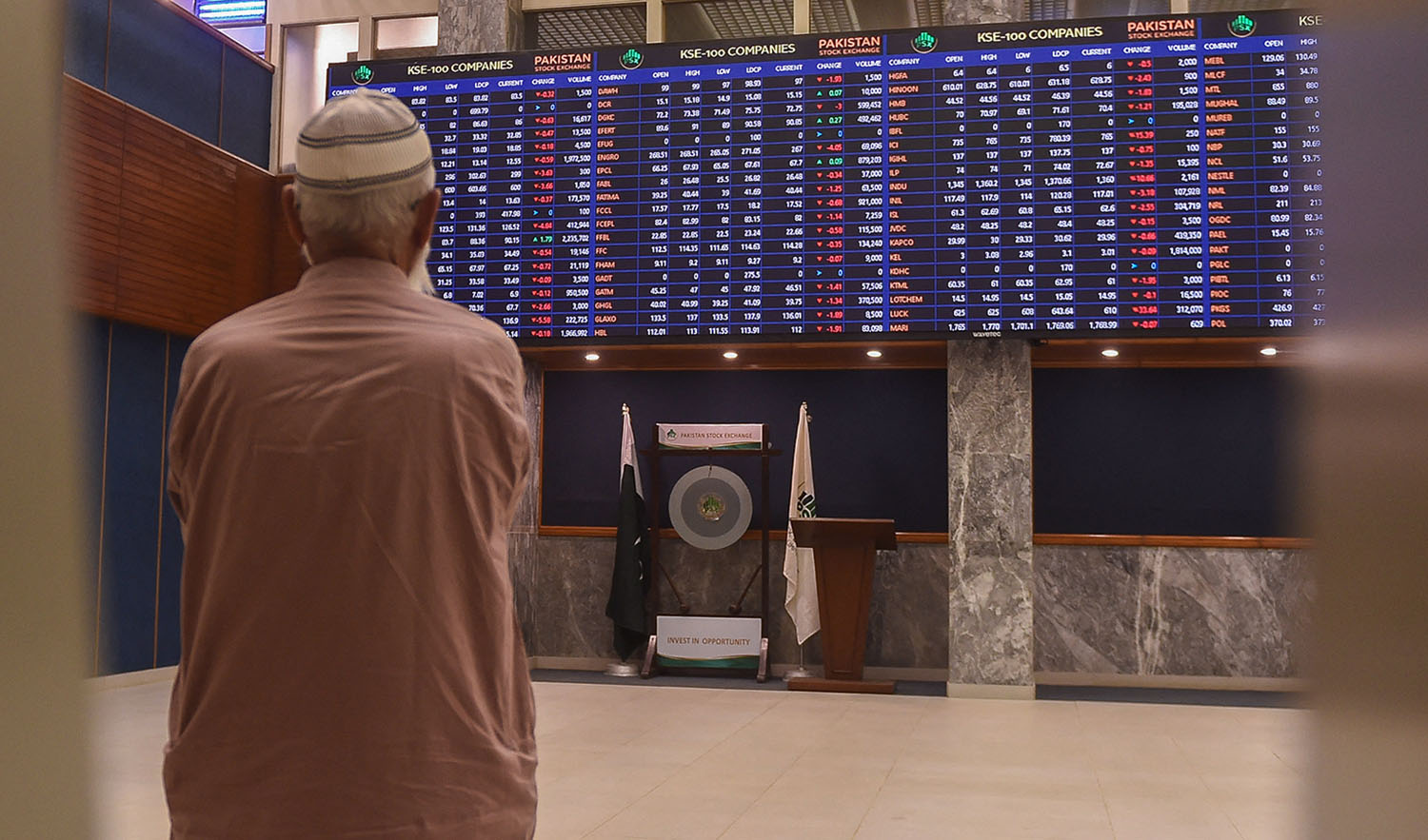 A stockbroker monitors the latest share prices during a trading session at the Pakistan Stock Exchange (PSX) in Karachi on April 4, 2022. (AFP/File)