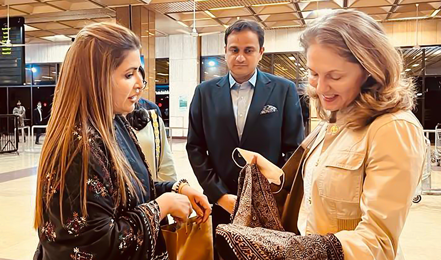 Pakistan's Minister for Poverty Alleviation Shazia Marri, left, receives Jordanian princess Sarah Zeid, right, at the Karachi airport on August 21, 2022. (Photo courtesy: Radio Pakistan)