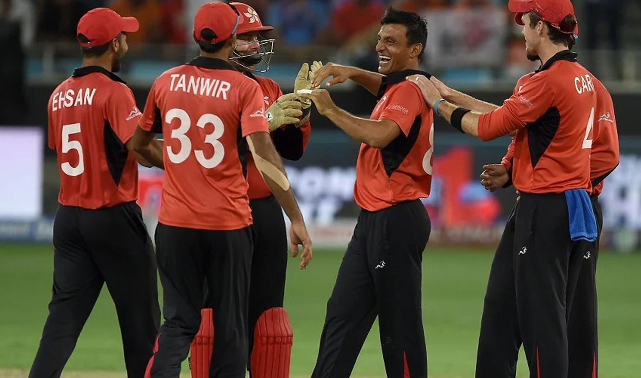 Team Hong Kong celebrates as they book their place at the Asia Cup following their win against UAE on August 24, 2022 in Muscat, Oman. (Wisden/Getty)