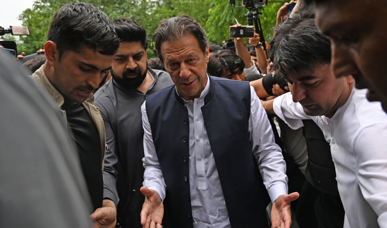 Pakistan's former prime minister Imran Khan (C) arrives before an anti-terrorist court in Islamabad on August 25, 2022. (AFP)