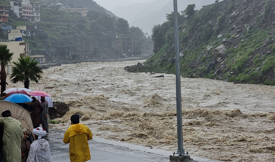 Tourists stranded near Swat river in Bahrain, Swat Pakistan on August 26, 2022. (Social Media)