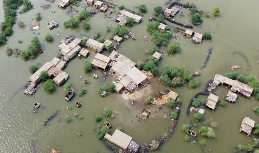 This aerial view shows a flooded residential area in Dera Allah Yar town after heavy monsoon rains in Jaffarabad district, Balochistan province on August 30, 2022. (AFP)