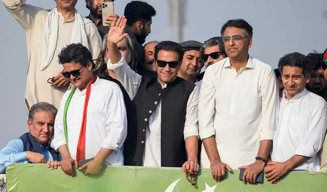 Ousted Pakistan's prime minister Imran Khan (C) waves at his party supporters during a rally in Islamabad on May 26, 2022. (AFP/File)