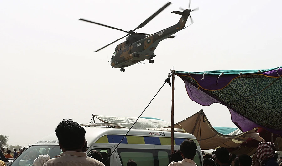 An army helicopter carrying injured passengers takes off from the site of a train accident in Daharki area of the northern Sindh province on June 7, 2021. (AFP/FILE)