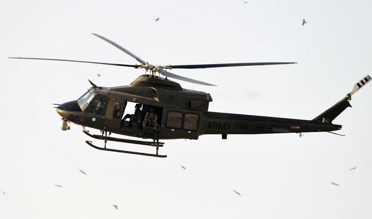 An army helicopter flies around National Stadium in Karachi on February 27, 2021. (AFP/File)
