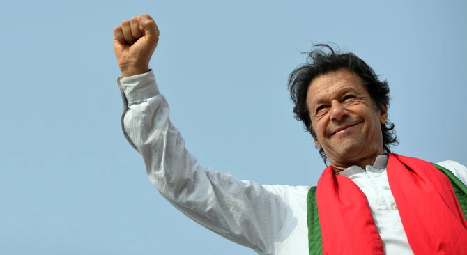 In this file photo, Pakistani opposition politician Imran Khan gestures to supporters during an anti-government protest in Islamabad on August 21, 2014. (AFP/FILE)