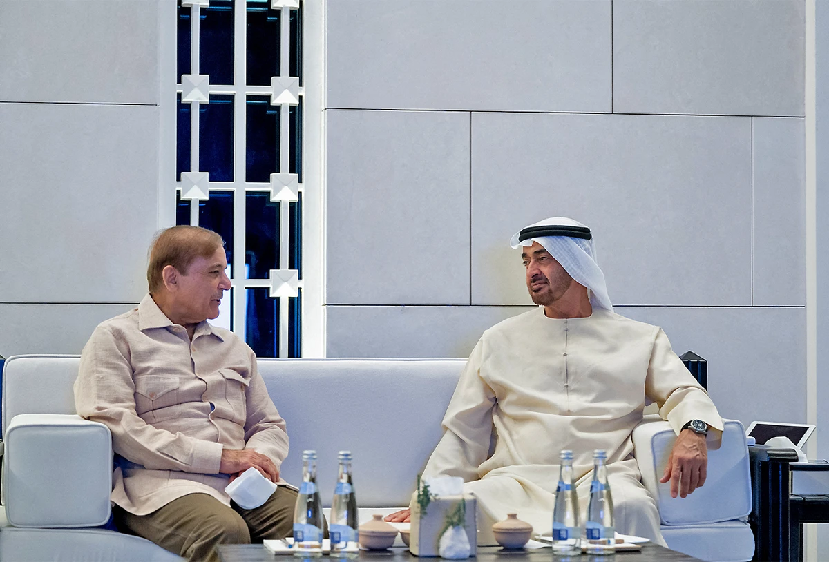 A handout picture released by UAE's Ministry of Presidential Affairs on April 30, 2022, shows president of the United Arab Emirates, Sheikh Mohamed bin Zayed Al Nahyan (R) meeting with Pakistan Prime Minister Shahbaz Sharif in the Gulf emirate. (AFP)