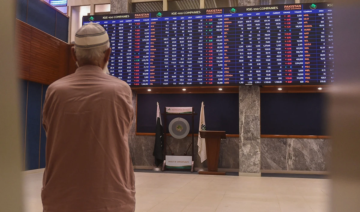 A stockbroker monitors the latest share prices during a trading session at the Pakistan Stock Exchange (PSX) in Karachi on April 4, 2022. (AFP/File)