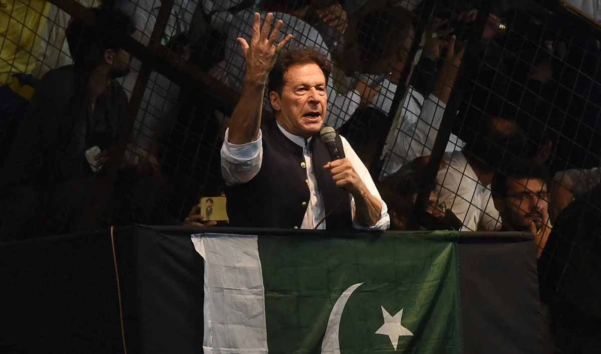 Pakistan's former Prime Minister Imran Khan delivers speech to his supporters during a rally to celebrate the 75th anniversary of Pakistan's independence day in Lahore on August 13, 2022. (AFP)