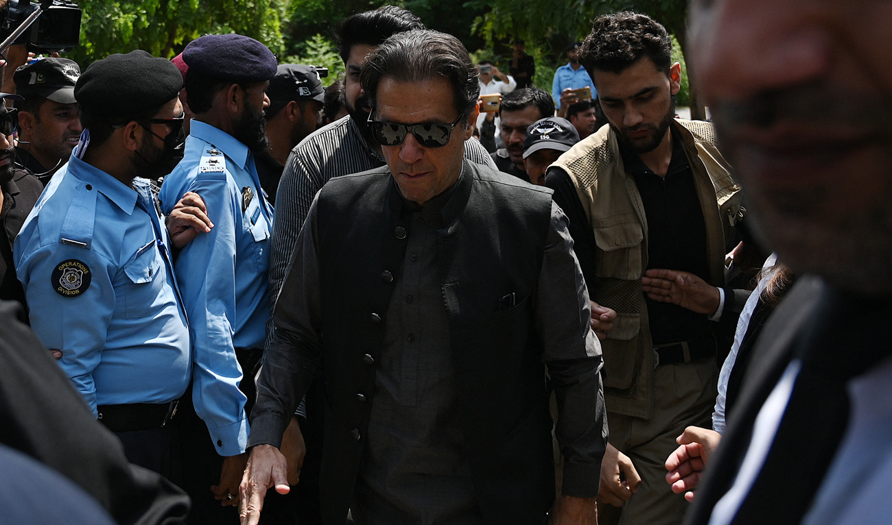 Former Pakistani prime minister Imran Khan (C) arrives to appear before the Anti-Terrorism Court in Islamabad on September 1, 2022. (AFP)