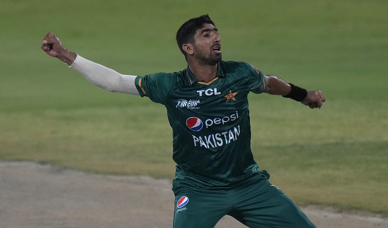 Pakistan's Shahnawaz Dahani celebrates after taking the wicket of Hong Kong's Yasim Murtaza during the T20 cricket match of Asia Cup between Pakistan and Hong Kong, in Sharjah, UAE on September 2, 2022. (AP)