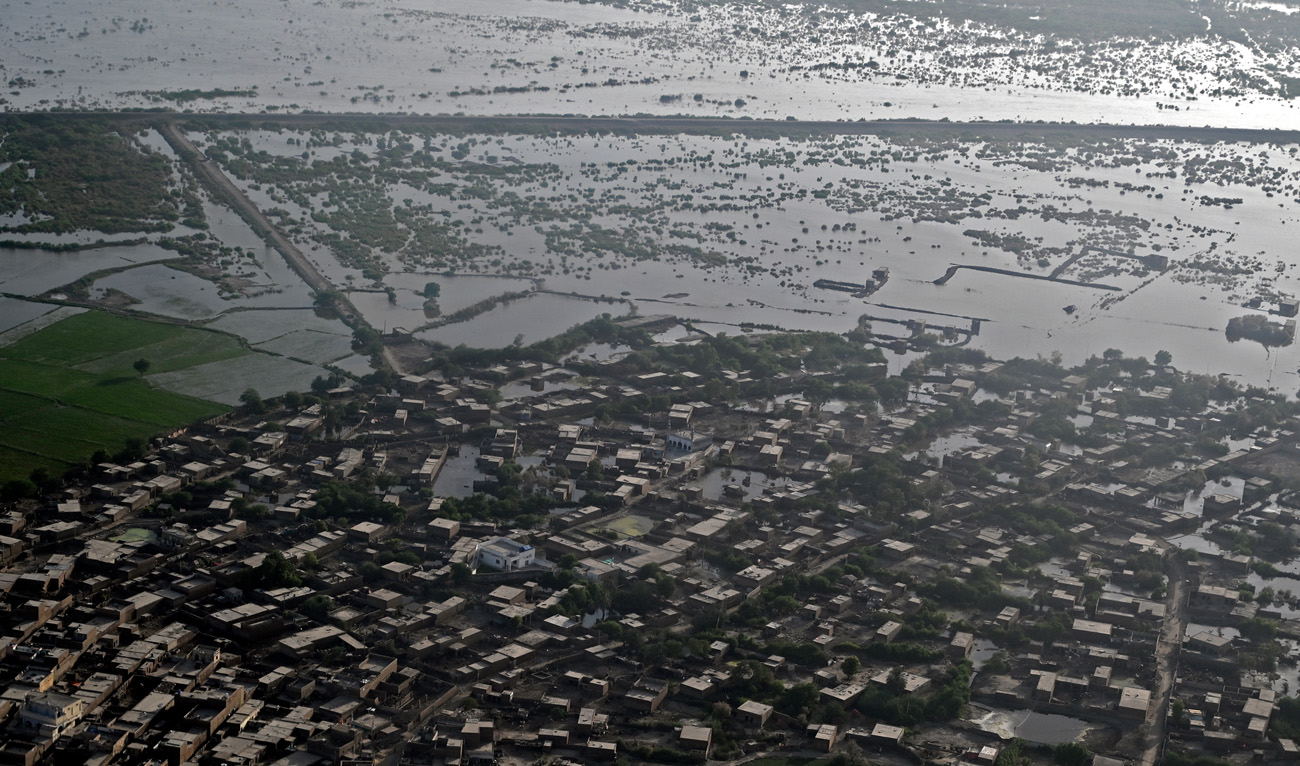 This aerial photograph taken on September 5, 2022 shows flooded residential areas after heavy monsoon rains in Sukkur, Sindh province. (AFP)