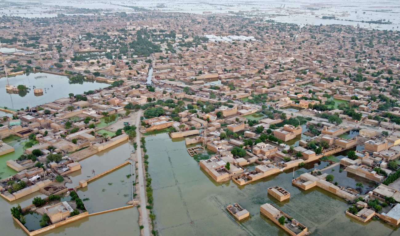This aerial photograph taken on September 5, 2022 shows flooded residential areas after heavy monsoon rains in Dera Allah Yar, Balochistan province. (AFP)