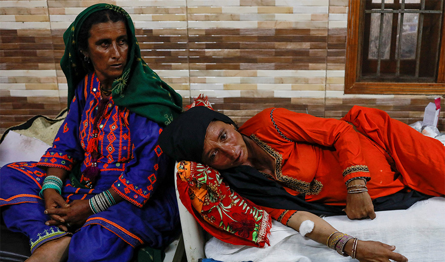 Pregnant women who became flood victims rest on beds as they undergo treatment in a hospital, following rains and floods during the monsoon season in Sehwan, Pakistan September 7, 2022. (REUTERS)