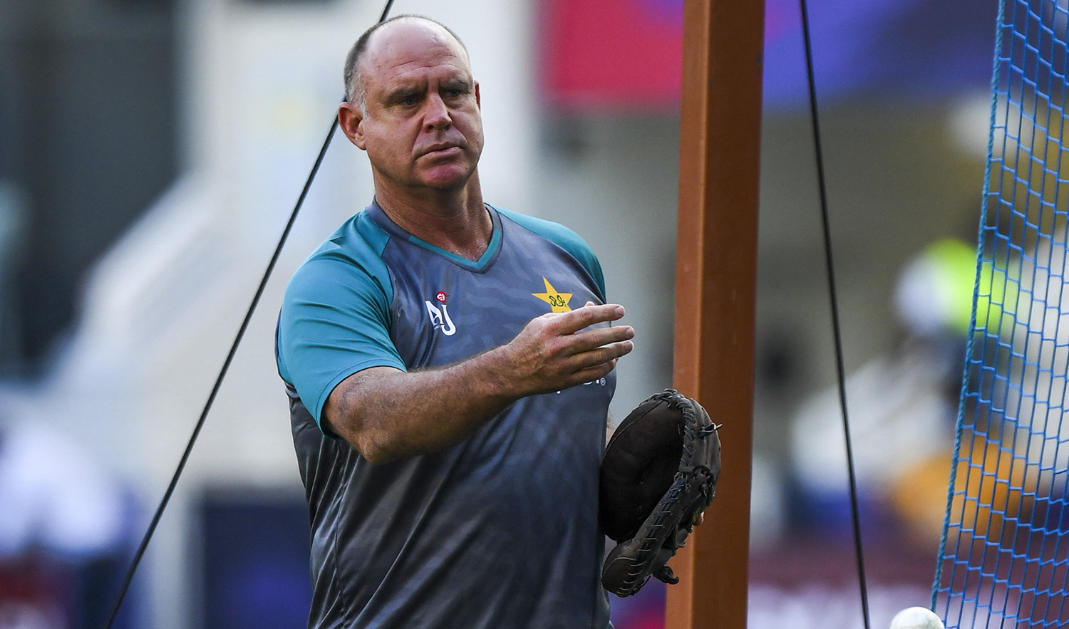 Matthew Hayden throws a ball before the start of the ICC men’s Twenty20 World Cup semi-final match between Australia and Pakistan at the Dubai International Cricket Stadium in Dubai on November 11, 2021. (AFP/File)