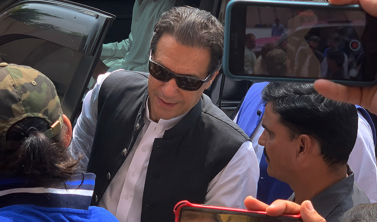 Pakistan's former prime minister Imran Khan (C) arrives to appear before the Anti-Terrorism Court in Islamabad on September 12, 2022. (AFP)