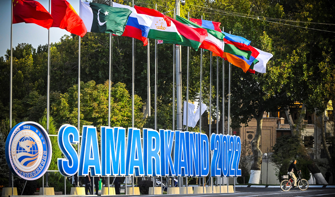 A man rides a bicycle in the Uzbek city of Samarkand on September 13, 2022, where several countries will meet this week for the summit of the Shanghai Cooperation Organisation. (AFP)