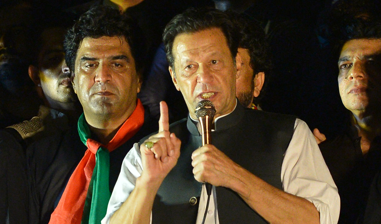 Pakistan's former Prime Minister and leader of the Pakistan Tehreek-e-Insaf party (PTI) Imran Khan, speaks during an anti-government protest rally in Islamabad on August 20, 2022. (AFP/File)