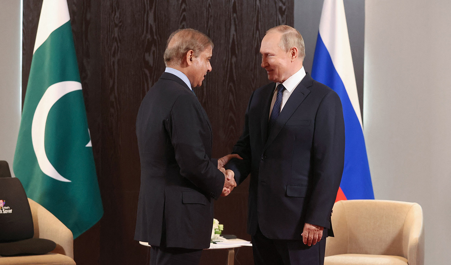 Russian President Vladimir Putin meets with Prime Minister of Pakistan Shehbaz Sharif on the sidelines of the Shanghai Cooperation Organisation (SCO) leaders' summit in Samarkand on September 15, 2022. (AFP)