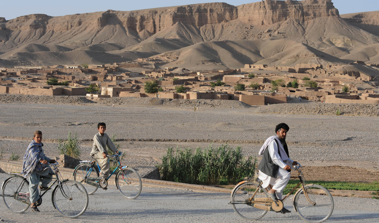 Pakistani commuters ride past on a road in Pishin, about 50 kilometres north of Quetta, the capital of Pakistan's Balochistan province on July 19, 2011. (AFP/File)