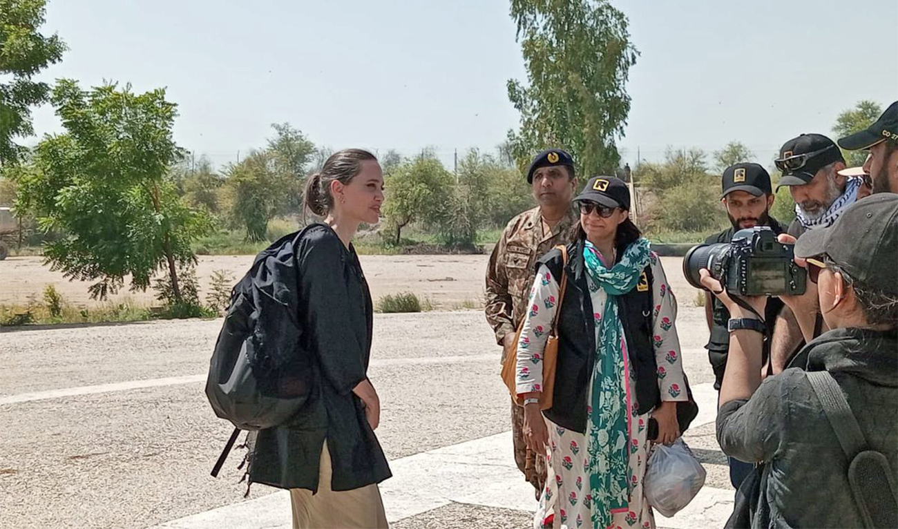 Angelina Jolie, a popular American actor, filmmaker and humanitarian, arrives in Dadu, Pakistan, to meet flood-hit communities on September 20, 2022. (@PTVNewsOfficial/Twitter)