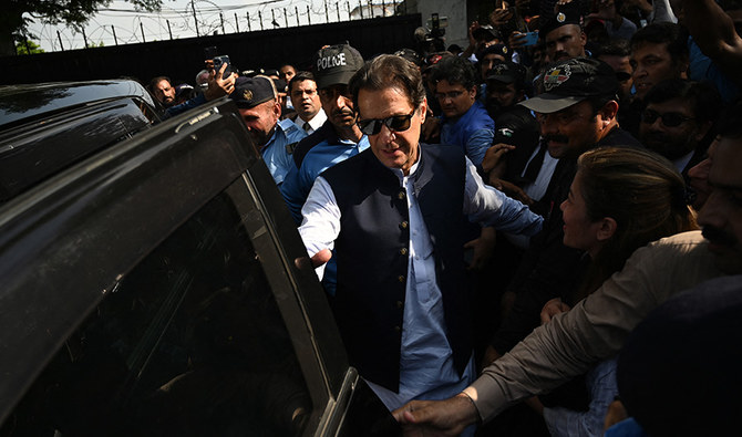 Pakistan's former Prime Minister Imran Khan (C) leaves after appearing before the High Court in Islamabad on August 31, 2022. (AFP)