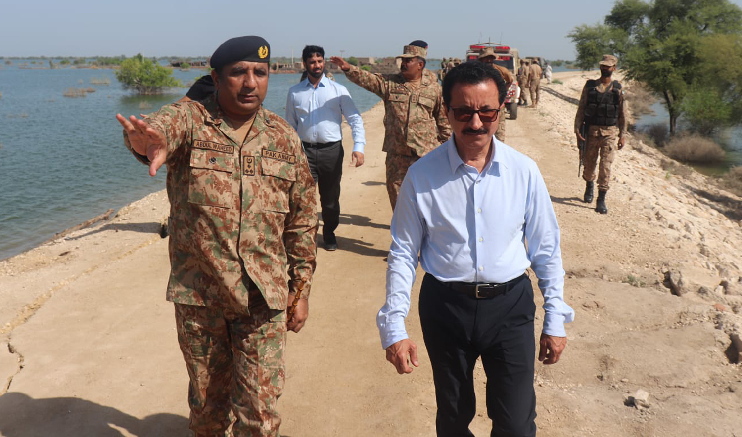 DP World chairman Sheikh Sultan bin Sulayem, front right, along with Pakistan Army officials visiting the flood affected areas of interior Sindh, Pakistan on September 23, 2022. (Photo courtesy: social media)