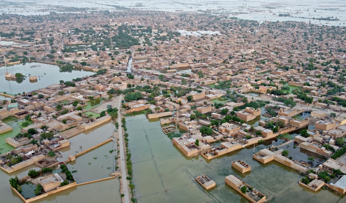 This aerial photograph taken on September 5, 2022 shows flooded residential areas after heavy monsoon rains in Dera Allah Yar, Balochistan province. (AFP)