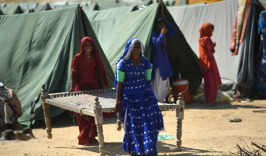 Internally displaced flood-affected people take refuge in a camp at Kotri in Jamshoro district of Sindh province on September 28, 2022. (AFP)