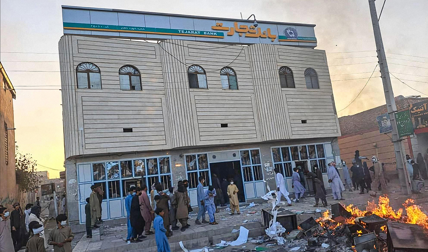 Barricades are on fire during clashes between civilians and security forces in Zahedan, southeastern Iran, on Sept. 30, 2022. (Photo courtesy: Muhammad Asif)