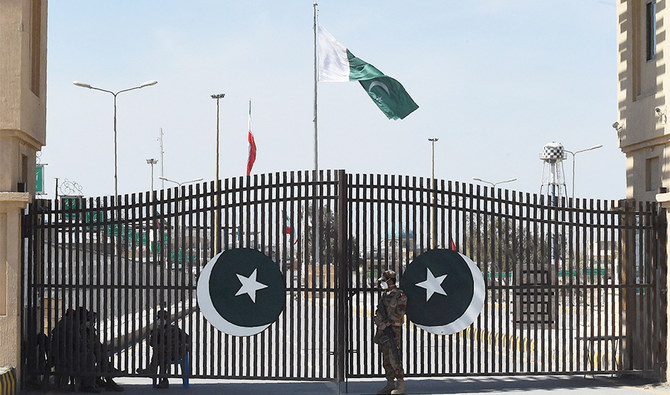 Pakistani soldiers wearing facemasks stand guard at the closed Pakistan-Iran border in Taftan on February 25, 2020. (AFP/File)