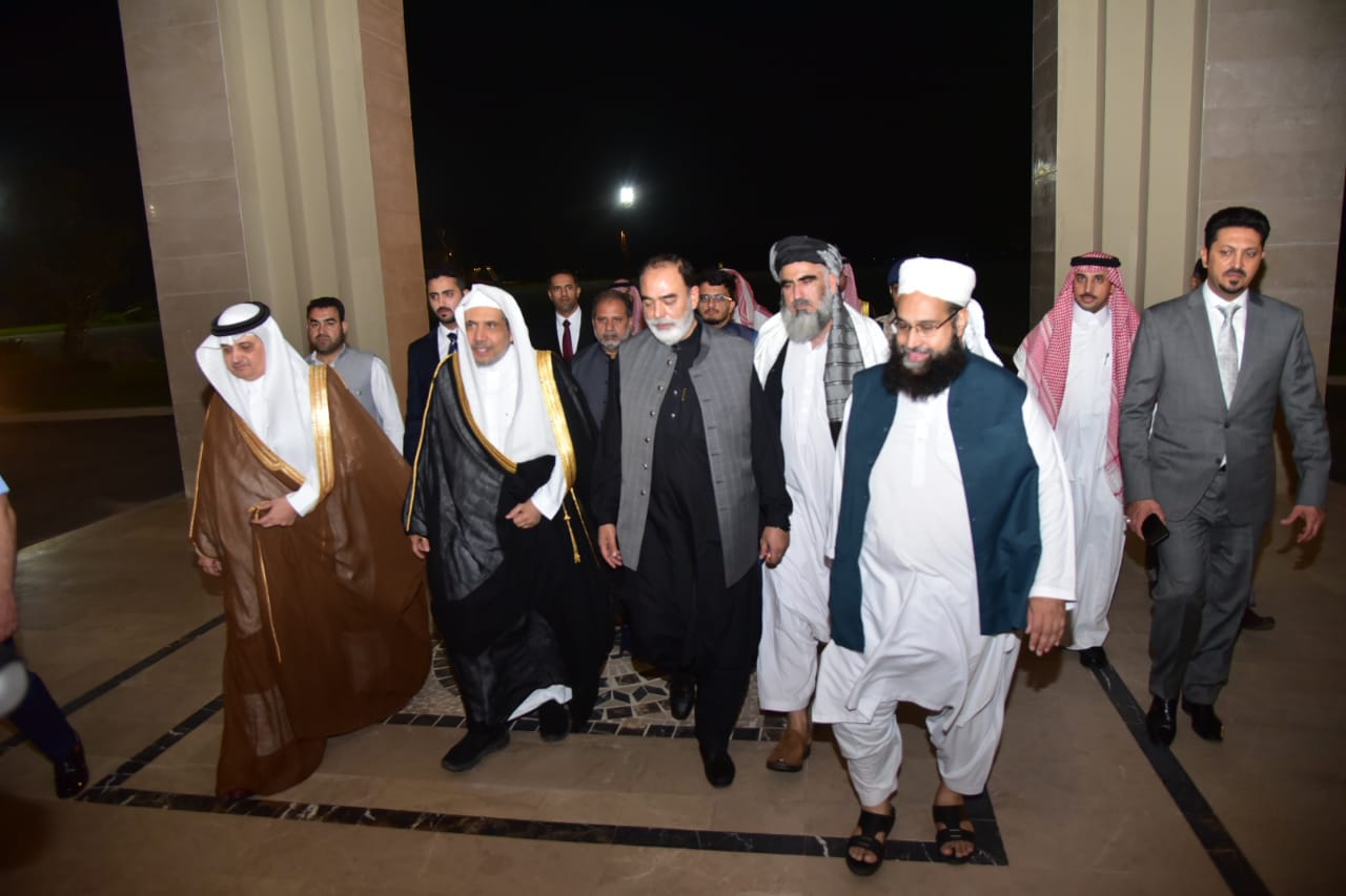 Muslim World League (MWL) Secretary General Dr. Muhammad bin Abdul Kareem Al-Issa (2nd from L) is being received by Pakistani officials in Islamabad on October 5, 2022. (@MORAisbOfficial/Twitter)