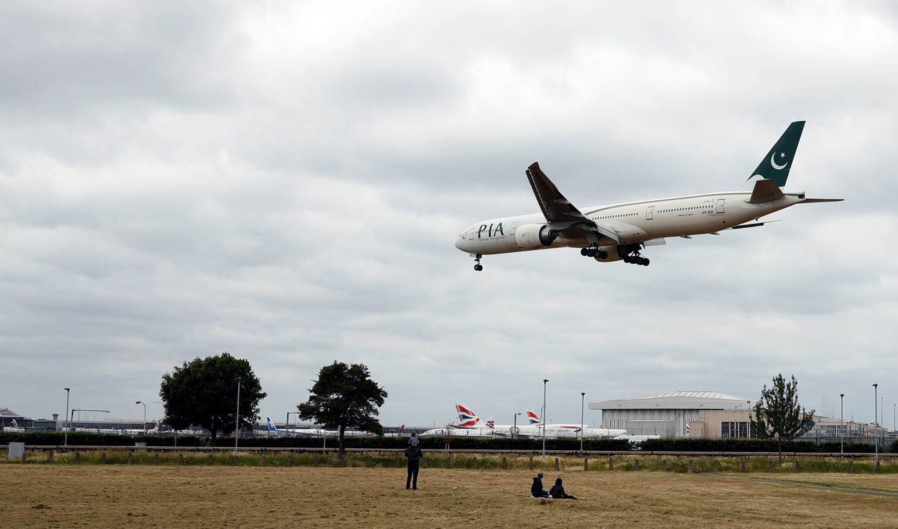 A Pakistan International Airlines Boeing 777 comes in to land at Heathrow airport in west London on June 8, 2020. (AFP/File)