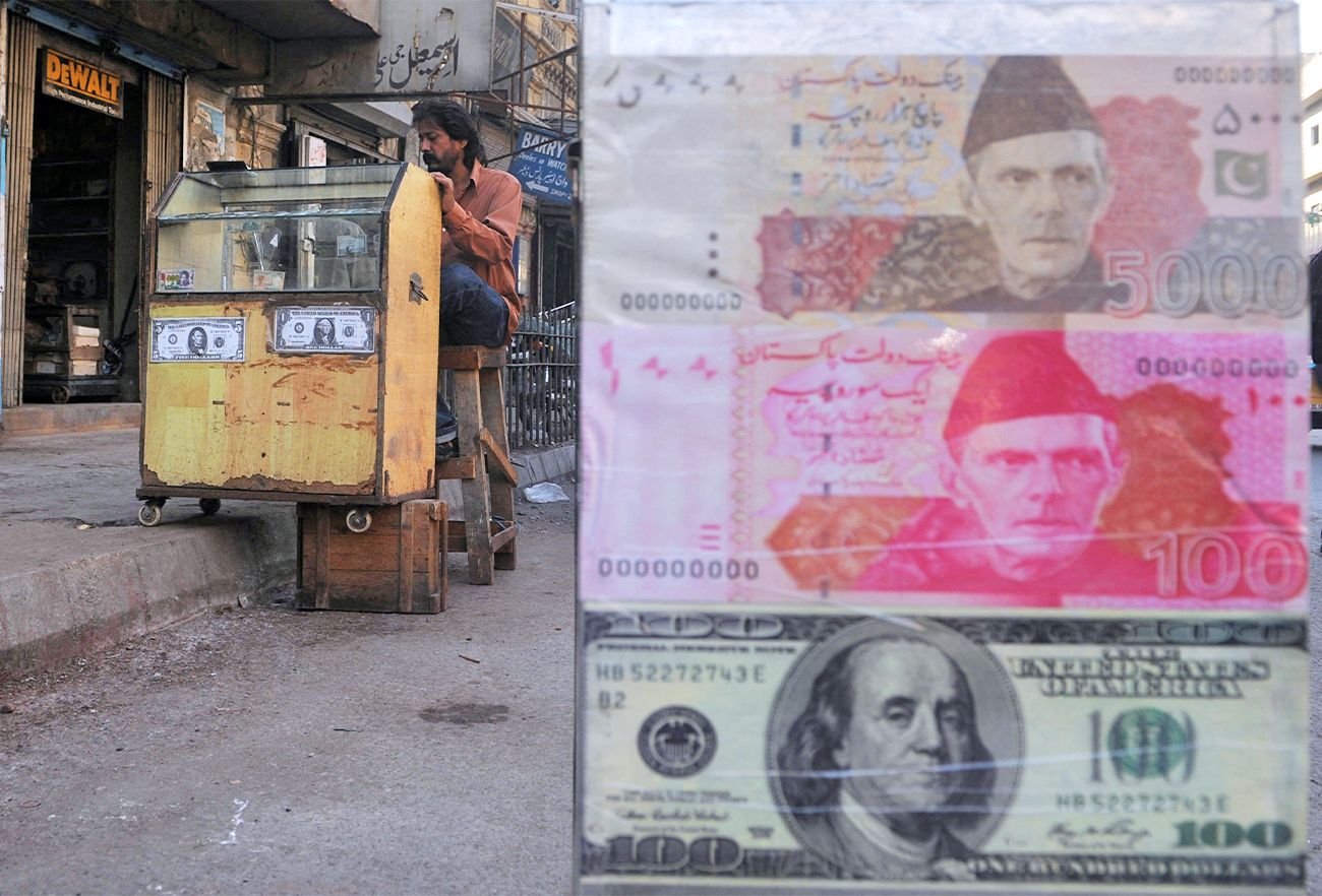 A hoarding display (R) showing currency notes are pictured as a money exchange vendor waits for customers at a local and foreign currency market in Karachi, Pakistan, on December 14, 2011. (AFP/File)