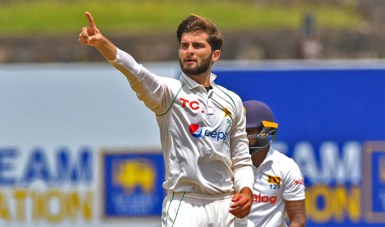 Pakistan’s Shaheen Shah Afridi celebrates after taking the wicket of Sri Lanka's Niroshan Dickwella (R) during the first day of the first cricket Test match between Sri Lanka and Pakistan at the Galle International Cricket Stadium in Galle on July 16, 2022. (AFP/File)